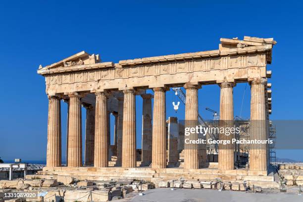 facade of the parthenon at the acropolis of athens, greece - athens democracy stock pictures, royalty-free photos & images