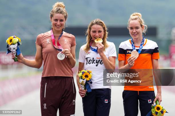 Silver medallist Marlen Reusser of Team Switzerland, gold medallist Annemiek van Vleuten of Team Netherlands and bronze medallist Anna van der...