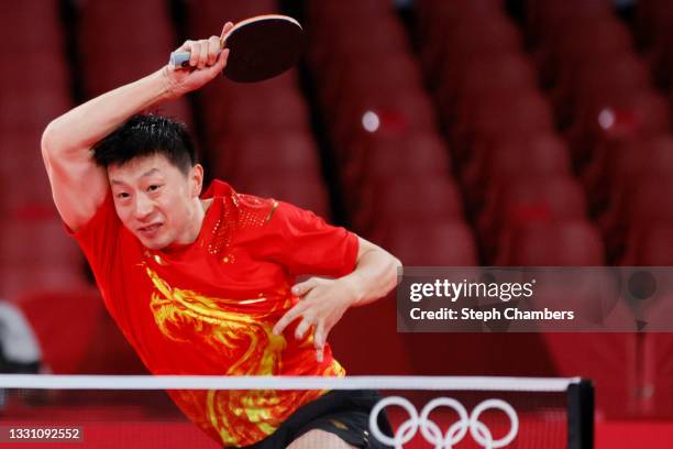 Ma Long of Team China in action during his Men's Singles Quarterfinals table tennis match on day five of the Tokyo 2020 Olympic Games at Tokyo...