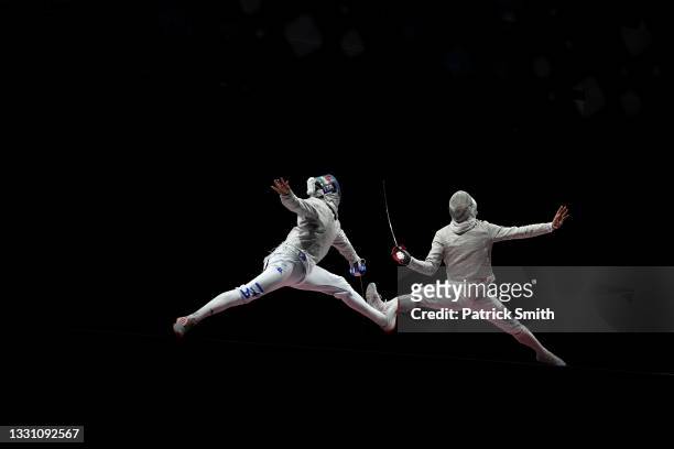 Luca Curatoli of Team Italy competes against Sanguk Oh of Team South Korea during the Men's Sabre Team Gold Medal Match on day five of the Tokyo 2020...