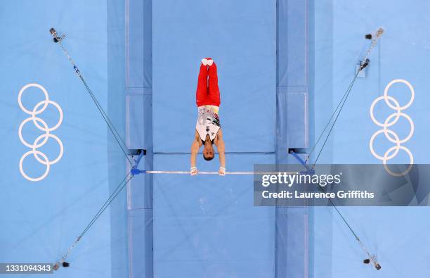 Lukas Dauser of Team Germany competes on horizontal bar during the Men's All-Around Final on day five of the Tokyo 2020 Olympic Games at Ariake...