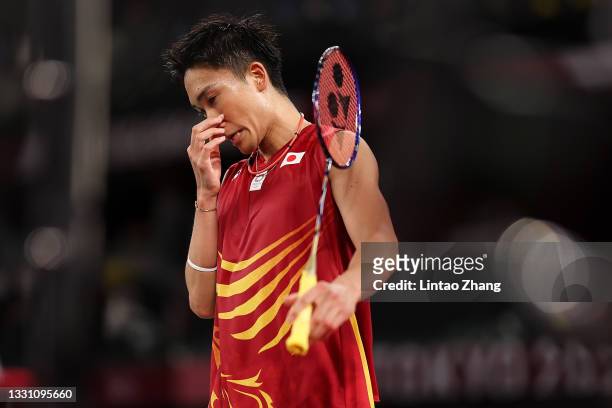 Kento Momota of Team Japan reacts as he competes against Heo Kwanghee of Team South Korea during a Men’s Singles Group A match on day five of the...