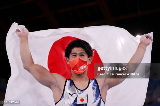 Daiki Hashimoto of Team Japan celebrates winning gold during the Men's All-Around Final on day five of the Tokyo 2020 Olympic Games at Ariake...