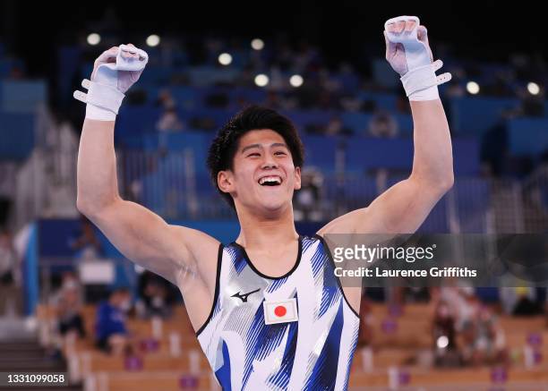 Daiki Hashimoto of Team Japan celebrates winning gold during the Men's All-Around Final on day five of the Tokyo 2020 Olympic Games at Ariake...