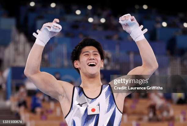 Daiki Hashimoto of Team Japan celebrates winning gold during the Men's All-Around Final on day five of the Tokyo 2020 Olympic Games at Ariake...