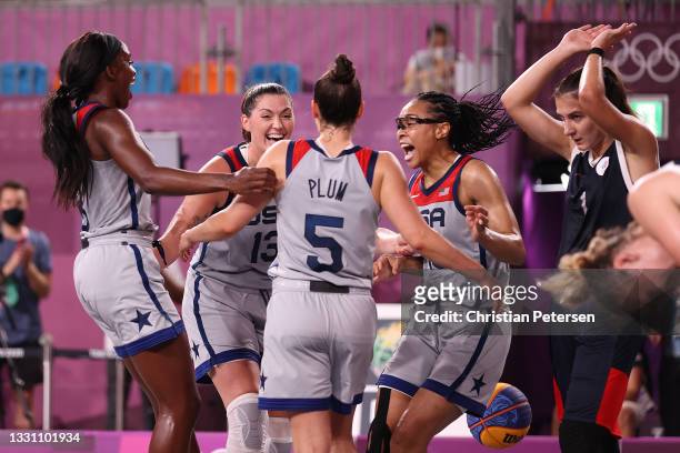 Jacquelyn Young, Stefanie Dolson, Kelsey Plum, and Allisha Gray of Team United States celebrate victory and winning the gold medal in the 3x3...