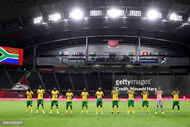 Players of Team South Africa stand for the national anthem prior to the Men's First Round Group A match between South Africa and Mexico on day five...