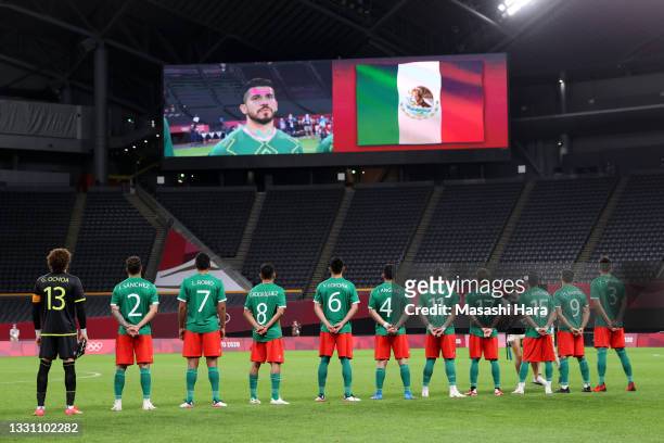 Players of Team Mexico stand for the national anthem prior to the Men's First Round Group A match between South Africa and Mexico on day five of the...