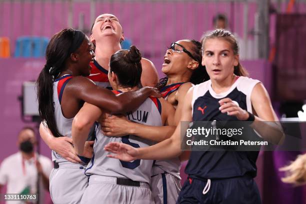 Jacquelyn Young, Stefanie Dolson, Kelsey Plum, and Allisha Gray of Team United States celebrate victory and winning the gold medal in the 3x3...