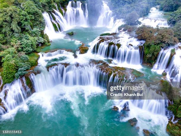 beautiful of ban gioc waterfall take by drone - vietnam jungle stock pictures, royalty-free photos & images