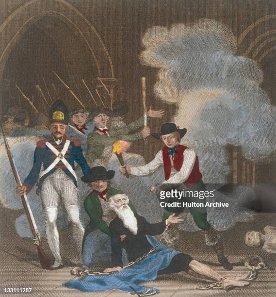 Citizens of Paris and the National Guard rescue an elderly prisoner from the Bastille prison, 14th July 1789. The storming and destruction of the...