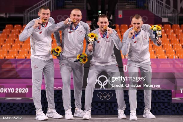 Gold medalists Nauris Miezis, Karlis Lasmanis, Edgars Krumins and Agnis Cavars of Team Latvia pose with their gold medals for the 3x3 Basketball...