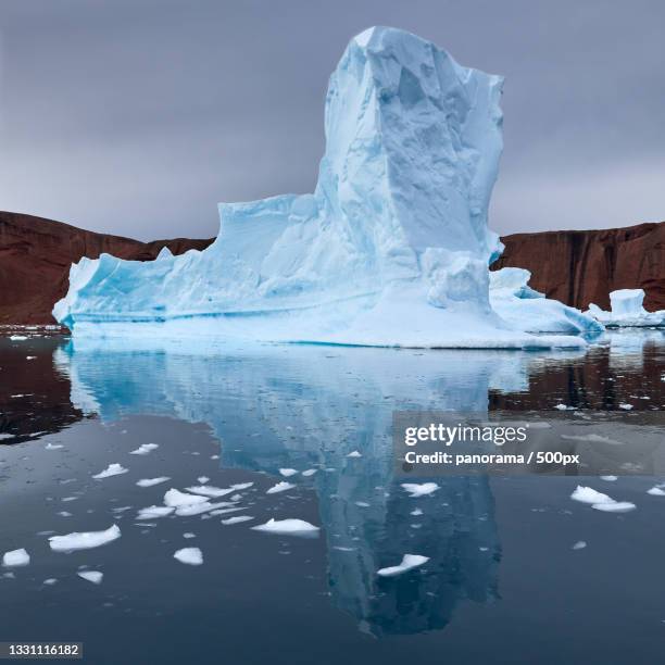 scenic view of frozen lake against sky - landslag stock pictures, royalty-free photos & images