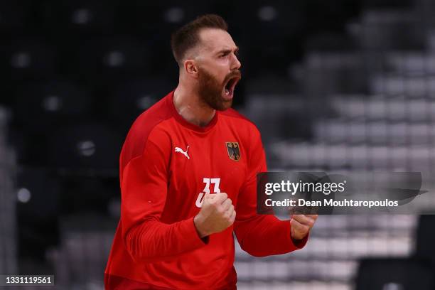 Andreas Wolff of Team Germany celebrates after making a save during the Men's Preliminary Round Group A handball match between France and Germany on...