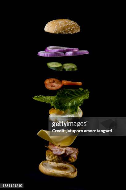 flying homemade burger - falling food stock pictures, royalty-free photos & images