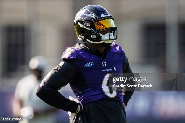 Patrick Queen of the Baltimore Ravens looks on during training camp at Under Armour Performance Center Baltimore Ravens on July 28, 2021 in Owings...