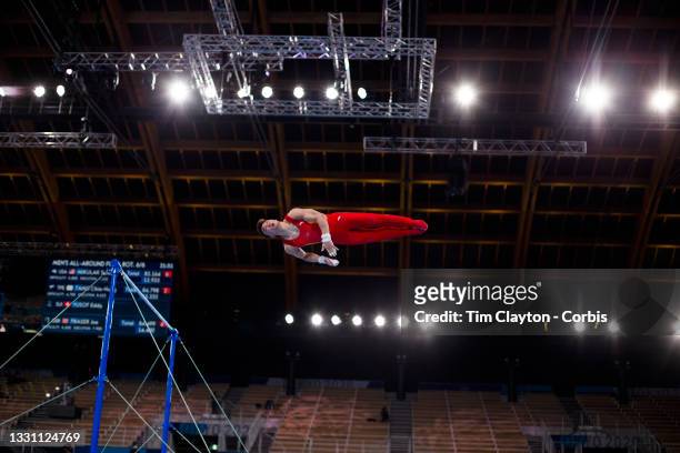 Wei Sun of China dismounts during his Horizontal Bar routine during the Men's All Round competition at Ariake Gymnastics Centre at the Tokyo 2020...