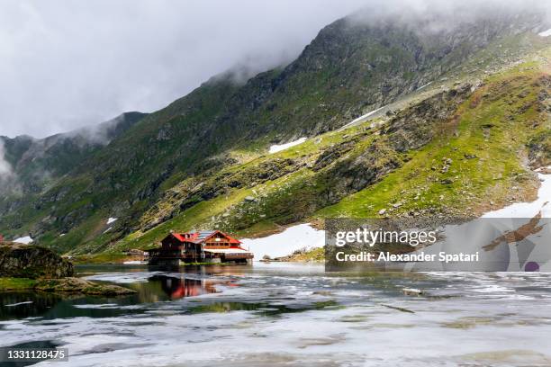 glacier lake balea in sibiu county, romania - romania stock pictures, royalty-free photos & images