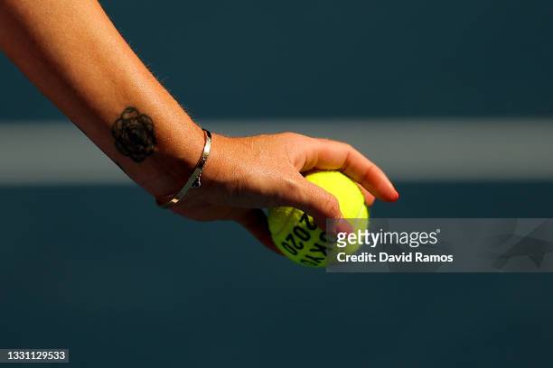 Details of a Tokyo 2020 tennis ball is seen as Anastasia Pavlyuchenkova of Team ROC serves during her Women's Singles Quarterfinal match against...