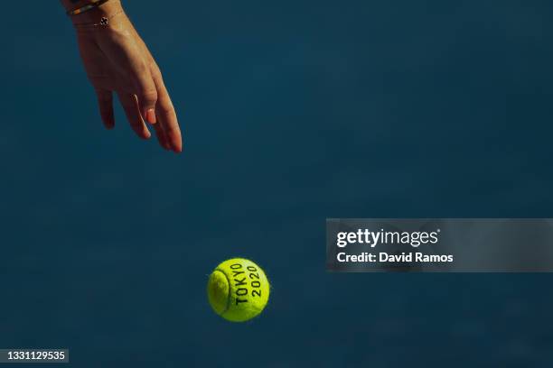 Details of a Tokyo 2020 tennis ball is seen as Anastasia Pavlyuchenkova of Team ROC serves during her Women's Singles Quarterfinal match against...