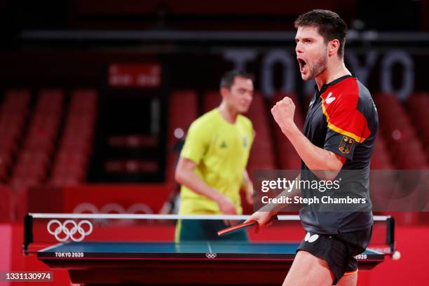 Dimitrij Ovtcharov of Team Germany reacts during his Men's Singles Quarterfinals table tennis match on day five of the Tokyo 2020 Olympic Games at...