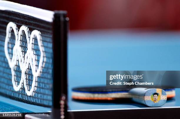 Photograph of Ma Long of Team China is seen on the base of his paddle during his Men's Singles Quarterfinals table tennis match on day five of the...