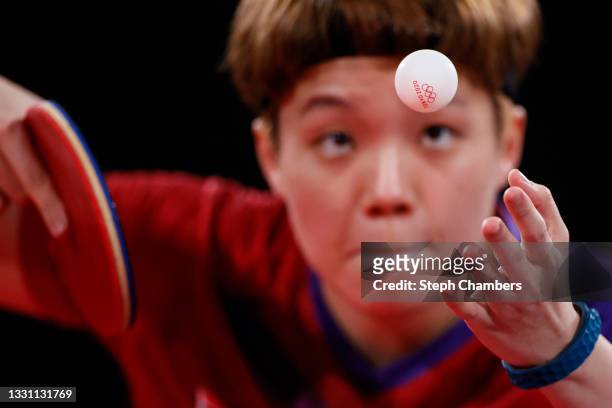 Doo Hoi Kem of Team Hong Kong serves the ball during her Women's Singles Quarterfinals table tennis match on day five of the Tokyo 2020 Olympic Games...