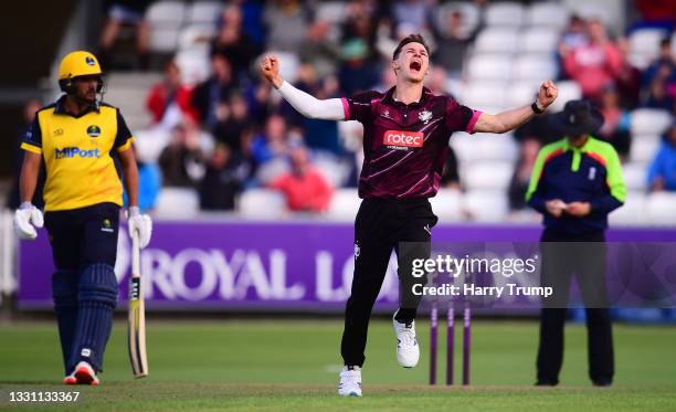 Sonny Baker of Somerset celebrates after taking the wicket of Callum Taylor of Glamorgan during the Royal London One Day Cup match between Somerset...