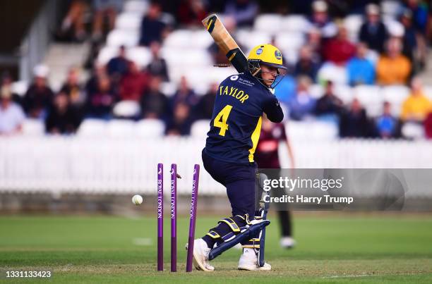 Callum Taylor of Glamorgan is bowled by Sonny Baker of Somerset during the Royal London One Day Cup match between Somerset and Glamorgan at The...