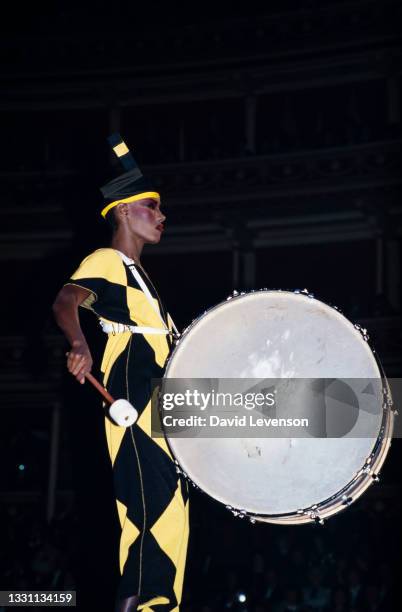 American fashion model and singer Grace Jones on the catwalk during the Fashion Aid show in aid of African famine relief, at the Royal Albert Hall in...