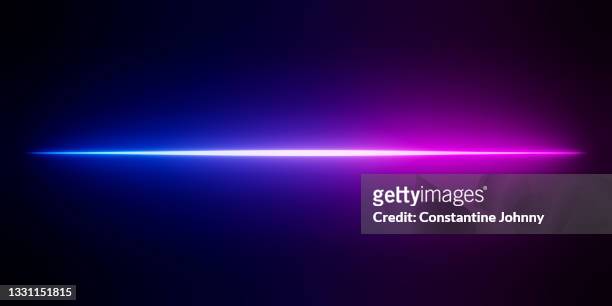 abstract neon purple and blue color light beam. horizontal line glowing background. - light beam fotografías e imágenes de stock