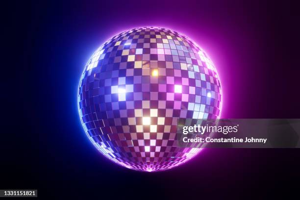 disco ball against dark background with glowing neon light - globo espelhado imagens e fotografias de stock