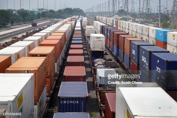 Shipping containers sit in a rail yard on July 28, 2021 in Chicago, Illinois. Strong consumer demand, coupled with an altered workforce caused by the...