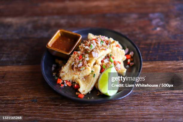 high angle view of food in plate on table - mexican food catering stock pictures, royalty-free photos & images