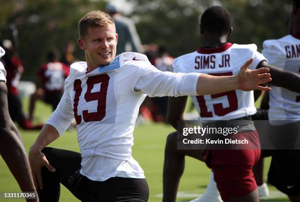 Adam Humphries of the Washington Football Team stretches during the Washington Football Team training camp on July 28, 2021 in Richmond, Virginia.