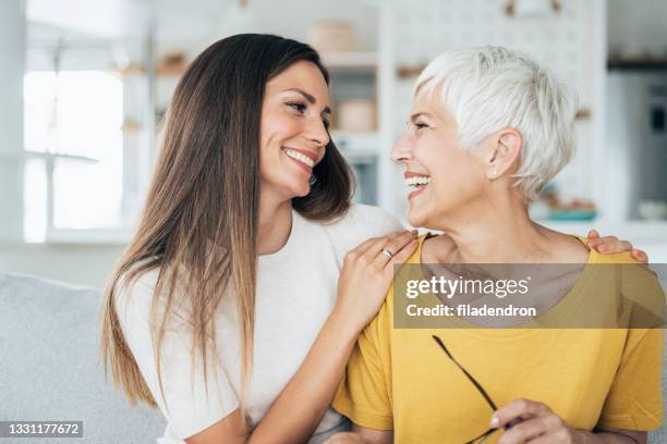 mother and daughter - beautiful grandmothers stock pictures, royalty-free photos & images