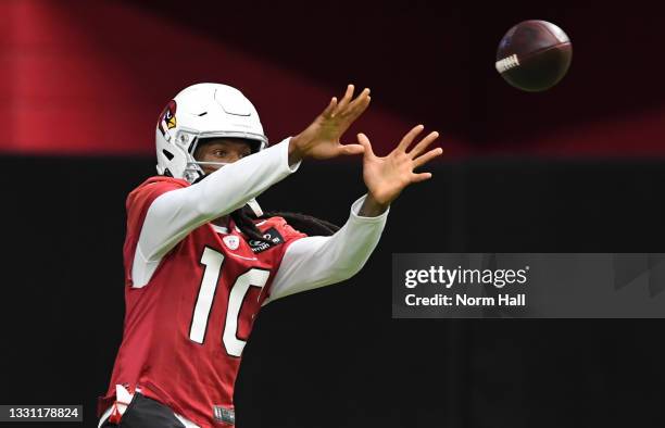 DeAndre Hopkins of the Arizona Cardinals catches a pass during Training Camp at State Farm Stadium on July 28, 2021 in Glendale, Arizona.
