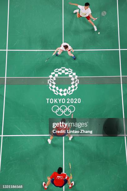 Yuta Watanabe and Arisa Higashino of Team Japan compete against Wang Yi Lyu and Huang Dong Ping of Team China during a Mixed Doubles Semi-final match...