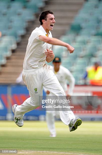 Patrick Cummins of Australia celebrates his 1st test wicket of Hashim Amla of South Africa during day 1 of the 2nd Sunfoil Series Test match between...