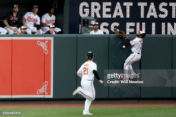 Cedric Mullins of the Baltimore Orioles is unable to make the catch on a ball hit off the wall during the first inning against the Miami Marlins at...