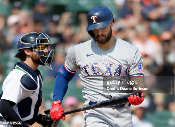 Joey Gallo of the Texas Rangers strikes out with catcher Eric Haase of the Detroit Tigers behind the plate during the ninth inning at Comerica Park...