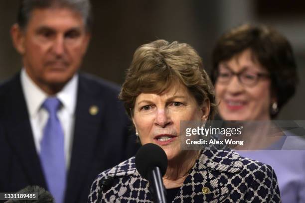Sen. Jeanne Shaheen speaks as Sen. Joe Manchin and Sen. Susan Collins listen during a news conference after a procedural vote for the bipartisan...