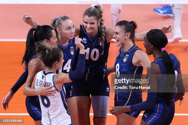 Team Italy celebrates after scoring a point against Team Argentina during the Women's Preliminary - Pool B volleyball on day six of the Tokyo 2020...