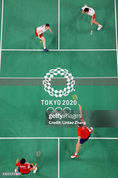 Yuta Watanabe and Arisa Higashino of Team Japan compete against Wang Yi Lyu and Huang Dong Ping of Team China during a Mixed Doubles Semi-final match...