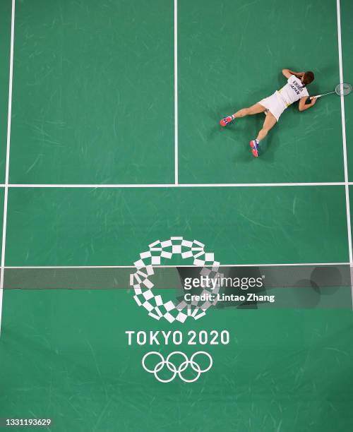 Nozomi Okuhara of Team Japan reacts as she competes against Michelle Li of Team Canada during a Women's Singles Round of 16 match on day six of the...