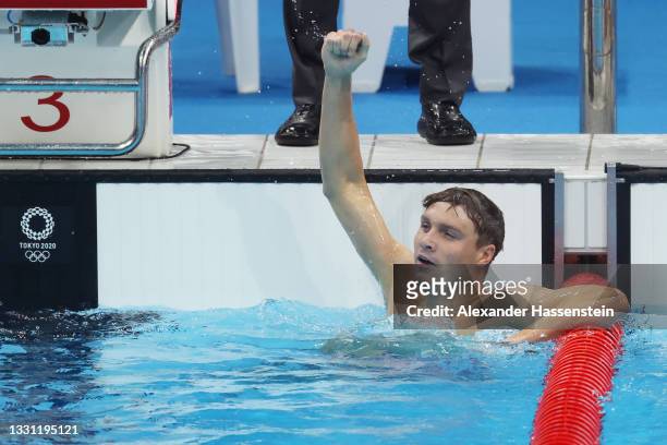 Robert Finke of Team United States reacts after winning the gold medal in the Men's 800m Freestyle Final on day six of the Tokyo 2020 Olympic Games...