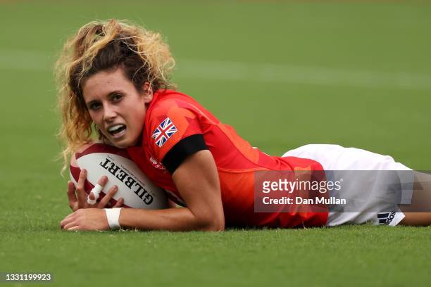 Abbie Brown of Team Great Britain celebrates scoring a try in the Women’s pool A match between Team ROC and Team Great Britain during the Rugby...