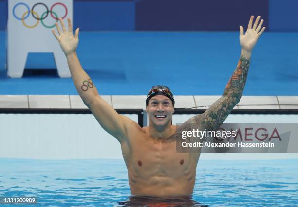 Caeleb Dressel of Team United States reacts after winning the gold medal in the Men's 100m Freestyle Final on day six of the Tokyo 2020 Olympic Games...