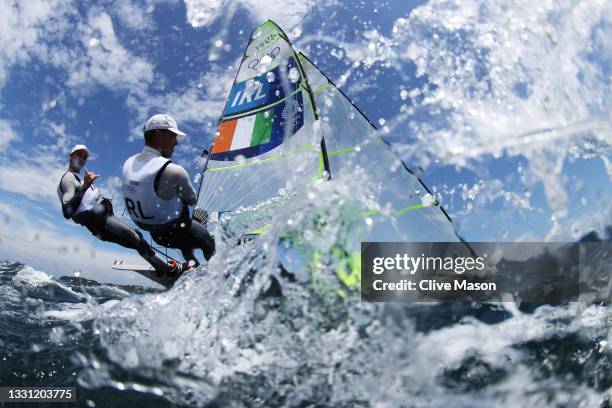 Robert Dickson and Sean Waddilove of Team Ireland head out onto the water to compete in the Men's Skiff 49er class on day six of the Tokyo 2020...