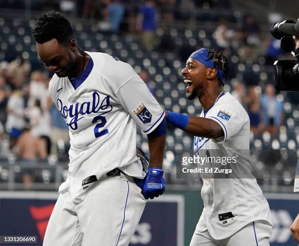 Michael A. Taylor of the Kansas City Royals is congratulated by Jarrod Dyson after his walk-off single in the 10th inning against the Chicago White...